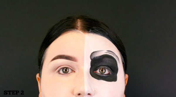 step 2 draw outline around eye and fill in with black face paint