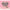 A pink box of Doll Beauty Individual Lashes - 02 Natural by Doll Beauty, containing 40 individual cluster lashes in various lengths (10mm, 12mm). The front features a heart-shaped window displaying the false eyelashes along with the text