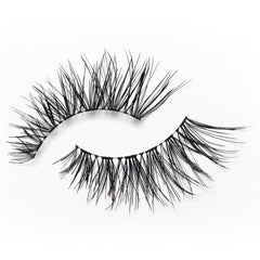 A multipack of Eylure Fluttery Light Lashes 008 (containing 3 pairs) is displayed on a white background, showcasing their wispy and voluminous design ideal for adding a dramatic flair to eye makeup.