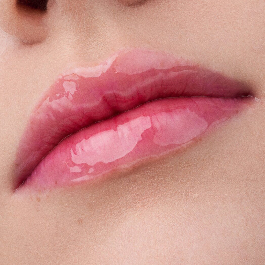Catrice Cosmetics Glossin' Glow Tinted Lip Oil (4ml) - Model Shot 4 [010 Keep It Juicy] 