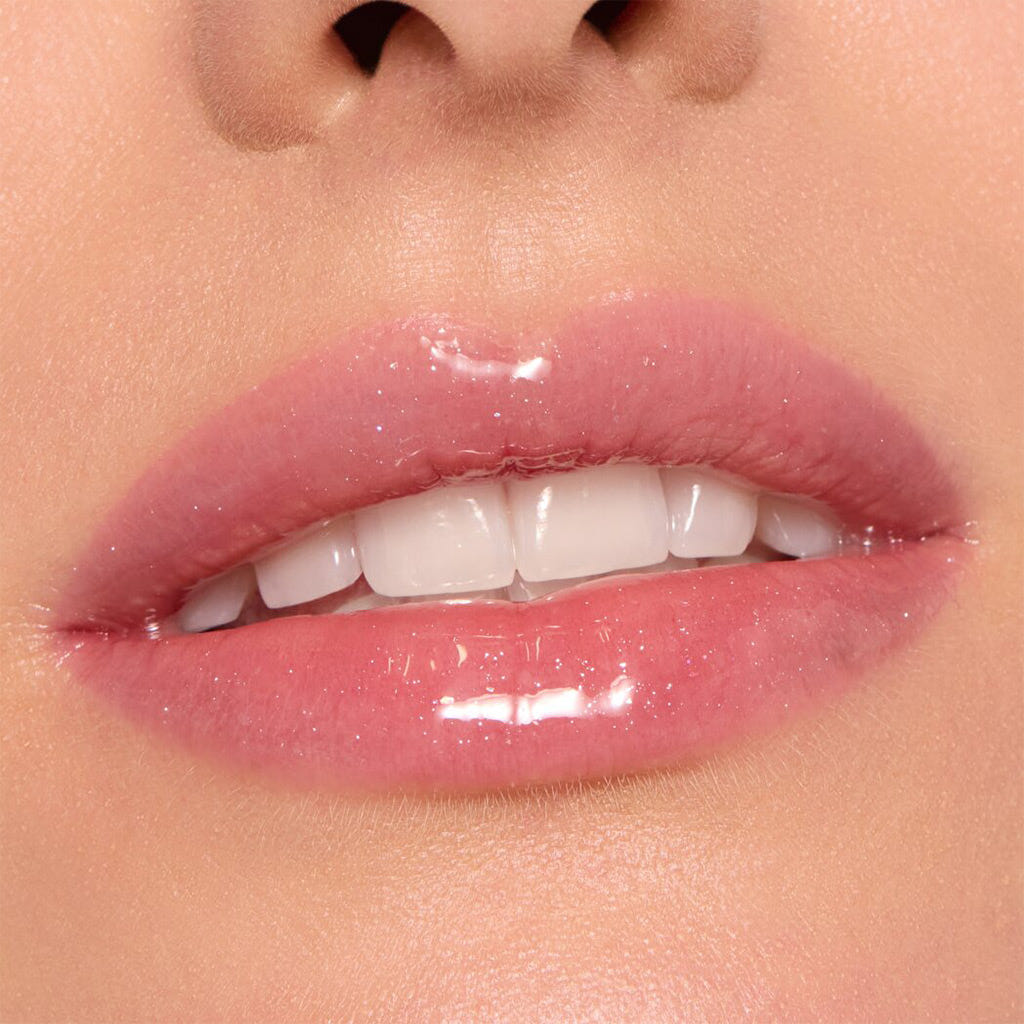 Catrice Cosmetics Glossin' Glow Tinted Lip Oil (4ml) - Model Shot 3 [060 Party Crasher]