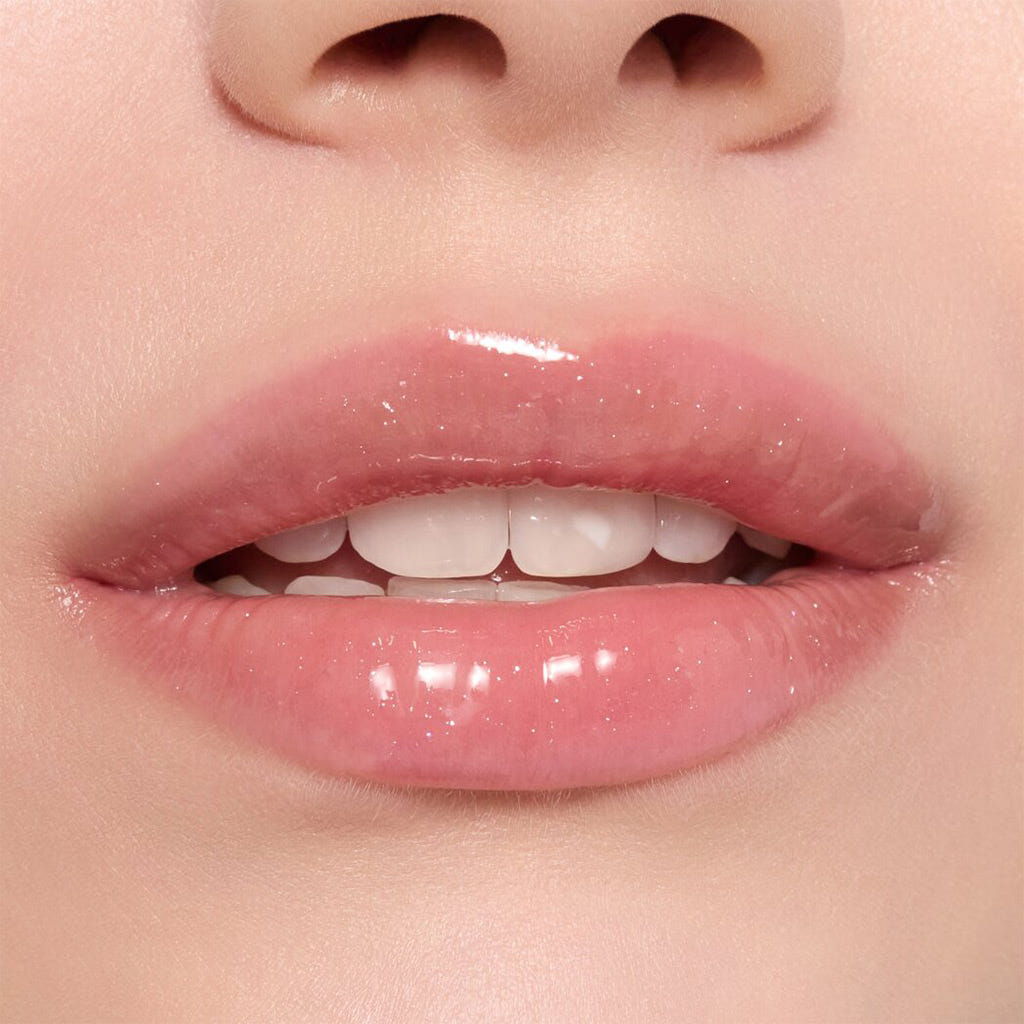 Catrice Cosmetics Glossin' Glow Tinted Lip Oil (4ml) - Model Shot 4 [060 Party Crasher]