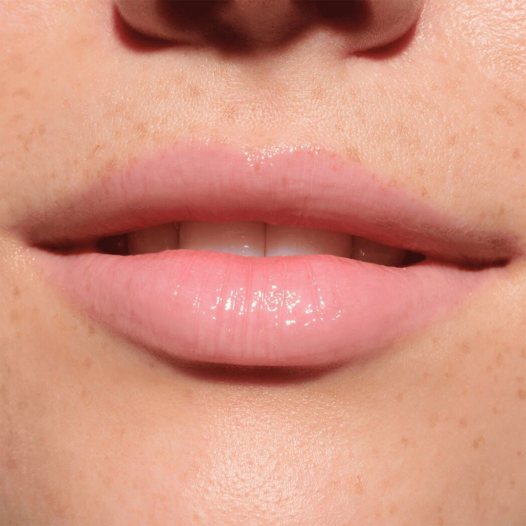 Catrice Cosmetics Melt & Plump Juicy Lip Plumper (1.8g) - Model Shot 2 [010 More Amore]