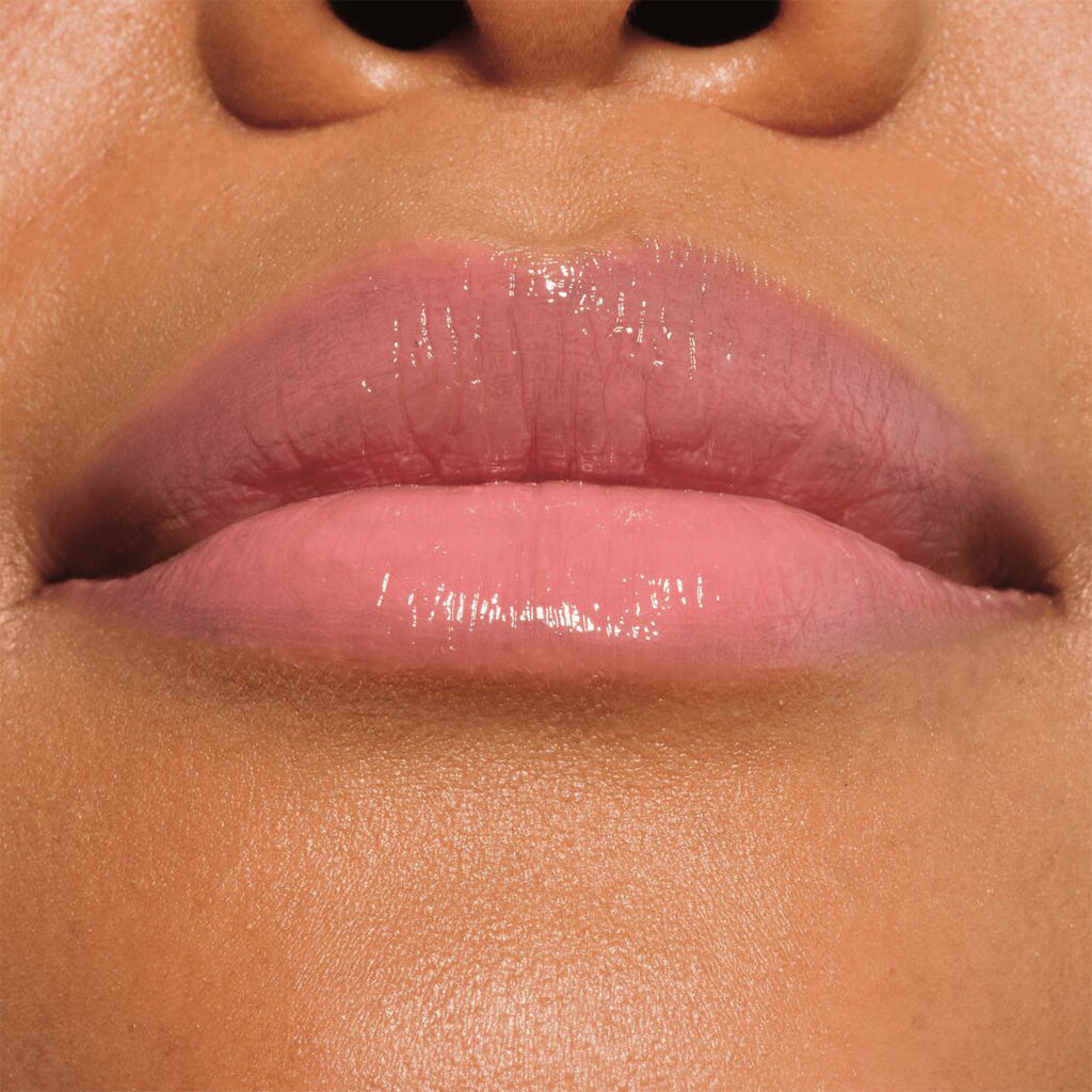 Catrice Cosmetics Melt & Plump Juicy Lip Plumper (1.8g) - Model Shot 2 [020 Hyp-nude-tized]