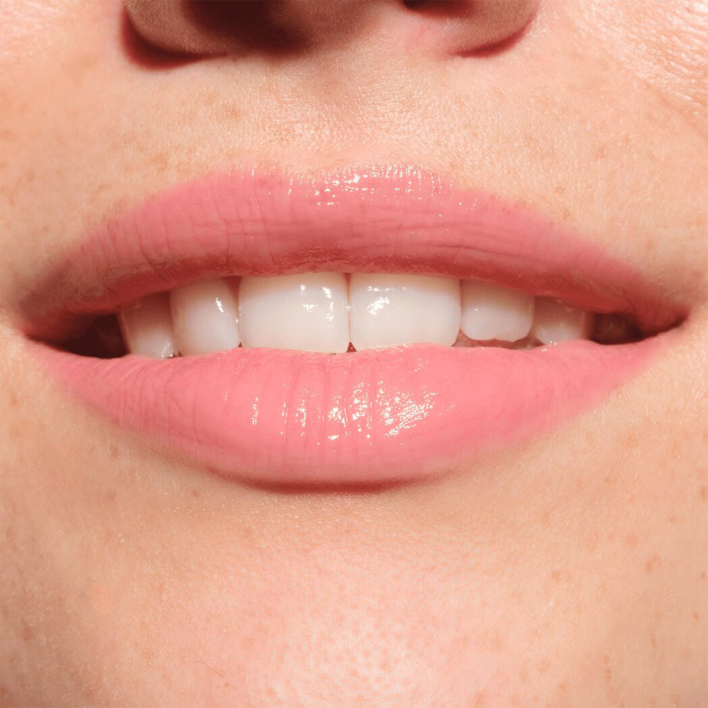 Catrice Cosmetics Melt & Plump Juicy Lip Plumper (1.8g) - Model Shot 3 [020 Hyp-nude-tized]