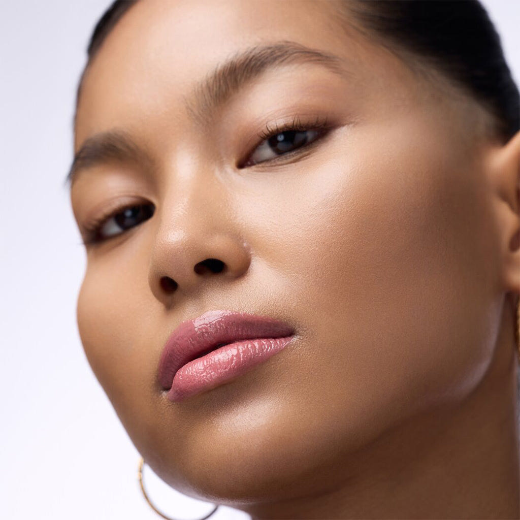 Catrice Cosmetics Melt & Plump Juicy Lip Plumper (1.8g) - Model Shot 4 [020 Hyp-nude-tized]