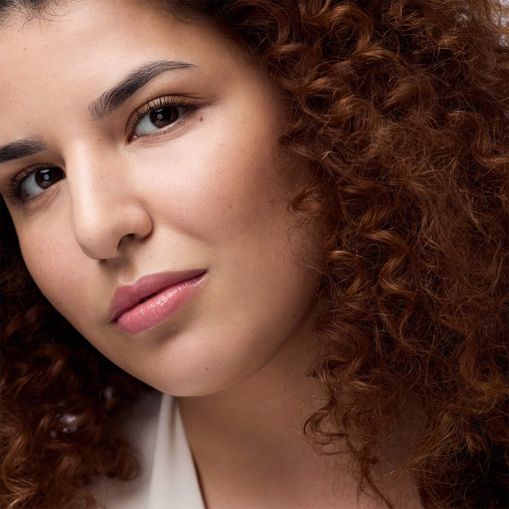 Catrice Cosmetics Melt & Plump Juicy Lip Plumper (1.8g) - Model Shot 5 [020 Hyp-nude-tized]
