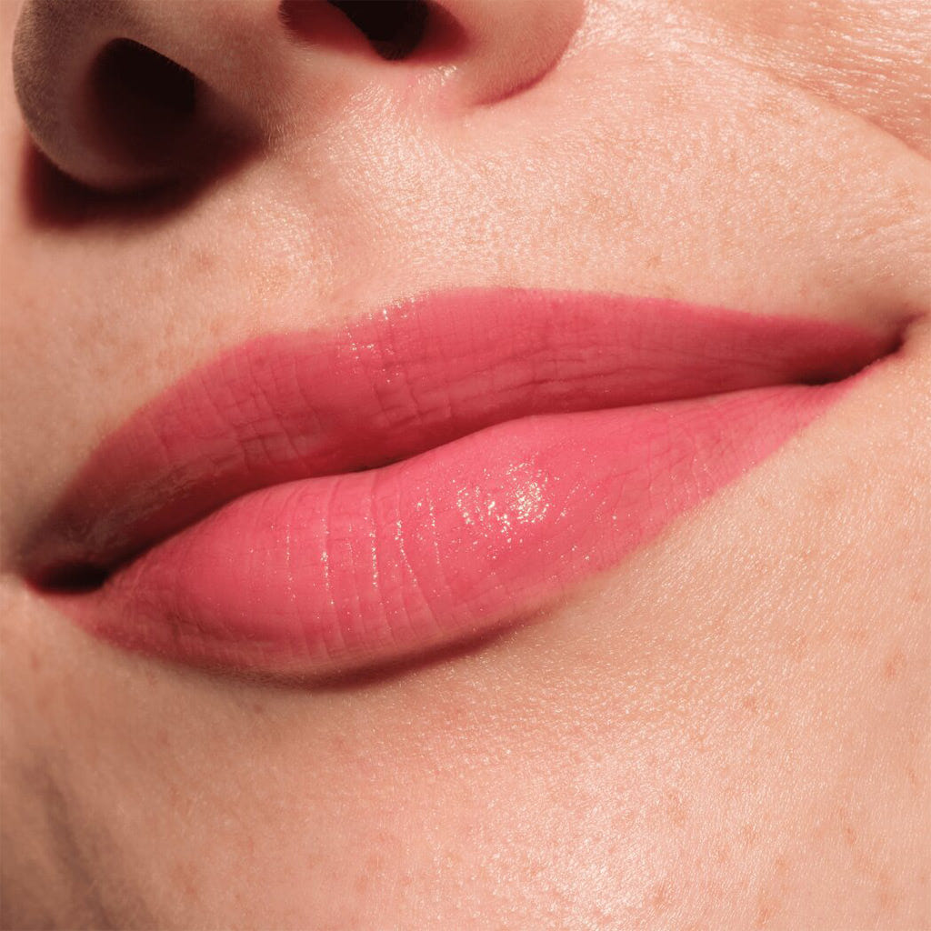Catrice Cosmetics Melt & Plump Juicy Lip Plumper (1.8g) - Model Shot 2 [050 Tropic Like It's Hot]