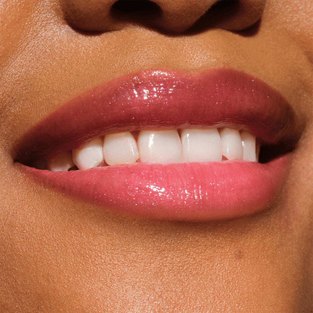Catrice Cosmetics Melt & Plump Juicy Lip Plumper (1.8g) - Model Shot 3 [050 Tropic Like It's Hot]