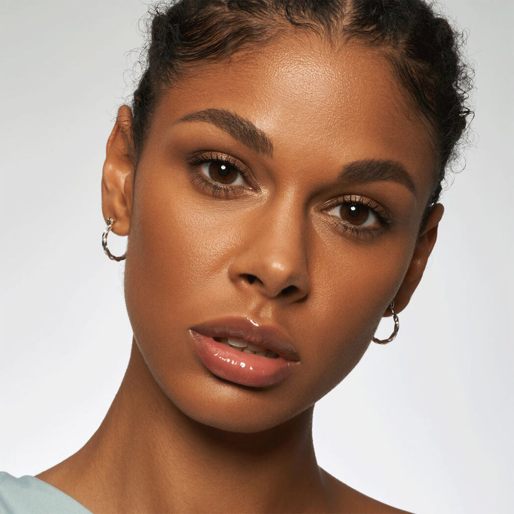 Catrice Cosmetics Plump It Up Lip Booster (3.5ml) - Model Shot 3 [010 Poppin' Champagne]