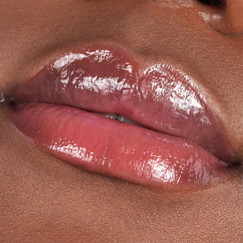 Catrice Cosmetics Plump It Up Lip Booster (3.5ml) - Model Shot 2 [080 Overdosed On Confidence]