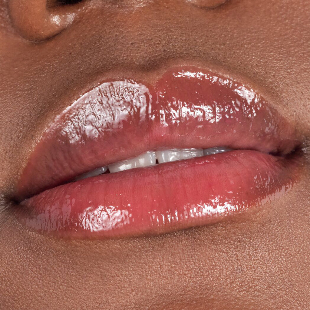 Catrice Cosmetics Plump It Up Lip Booster (3.5ml) - Model Shot 2 [090 Potentially Scandalous]