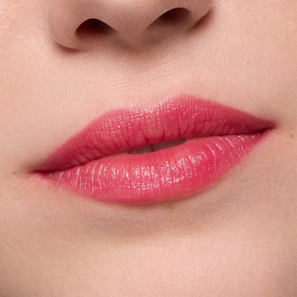 Essence Heart Core Fruity Lip Balm (3g) - Model Shot 1 [01 Crazy Cherry]