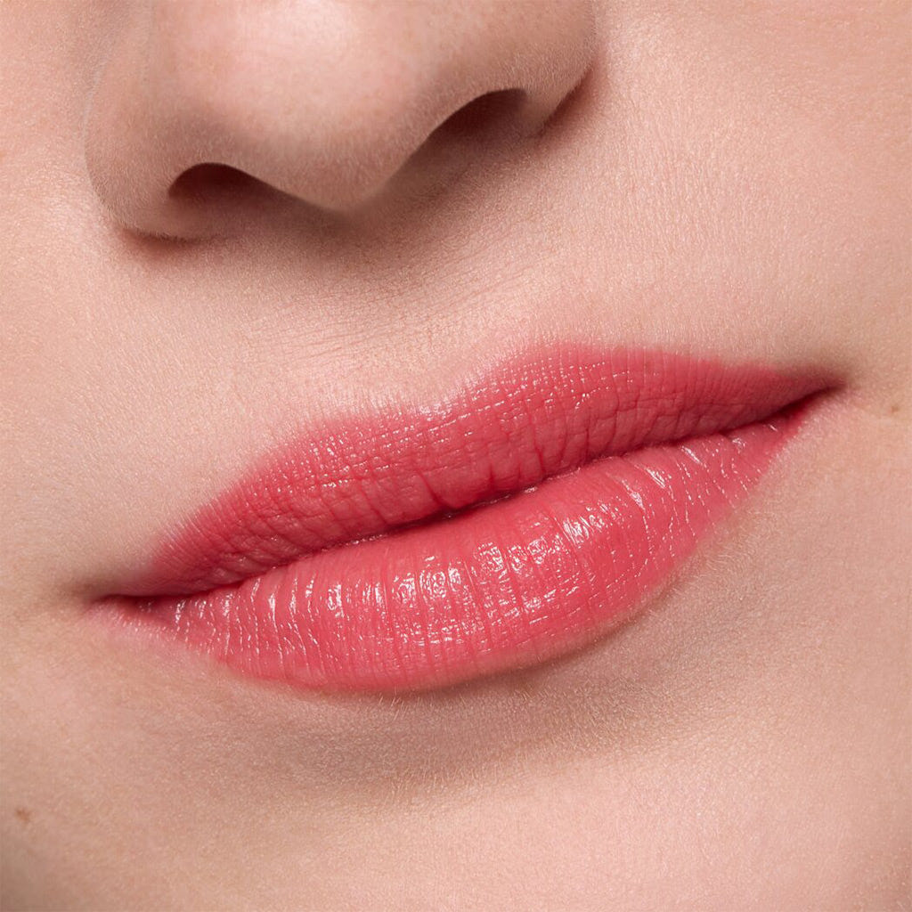 Essence Heart Core Fruity Lip Balm (3g) - Model Shot 2 [02 Sweet Strawberry]